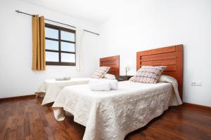Posteľ alebo postele v izbe v ubytovaní FTV Holidays Homes