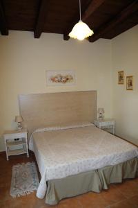 A bed or beds in a room at B&B Vaiana