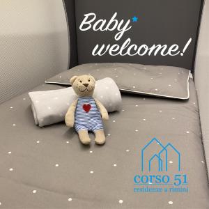Postel nebo postele na pokoji v ubytování Suite Apartments - Corso51