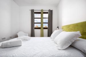 Posteľ alebo postele v izbe v ubytovaní FTV Holidays Homes