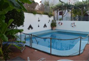 Bazén v ubytování Appartamento in Villa il Kent a 2 passi dal mare nebo v jeho okolí