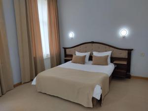 Postel nebo postele na pokoji v ubytování Shindan Hotel Astara