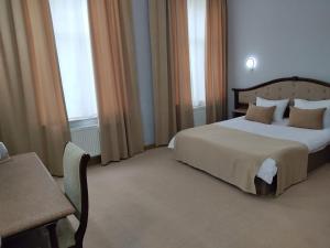 Postel nebo postele na pokoji v ubytování Shindan Hotel Astara