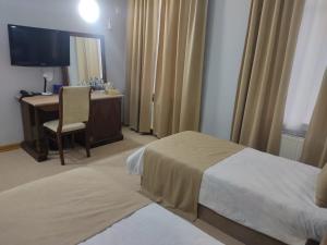 Postel nebo postele na pokoji v ubytování Shindan Hotel Astara