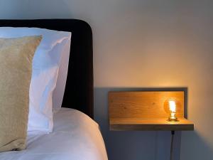 Postel nebo postele na pokoji v ubytování B&B 't klein GELUK