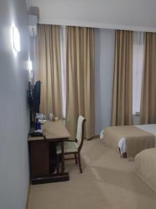 Postel nebo postele na pokoji v ubytování Shindan Hotel Astara