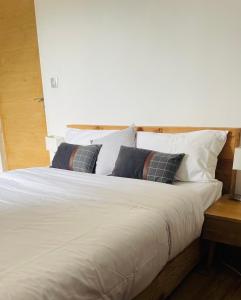 Posteľ alebo postele v izbe v ubytovaní Duplex Dent d'Oche