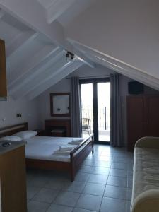 Posteľ alebo postele v izbe v ubytovaní Villa Lithitsa + 26 fotografií