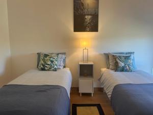 Llit o llits en una habitació de NEW Restored Solar in Villa close to RIVERS and Serra Estrela