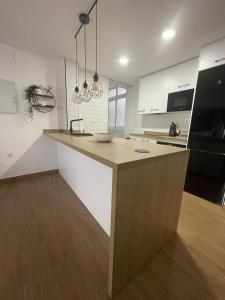 Kuchnia lub aneks kuchenny w obiekcie Apartamento El Palo Beach