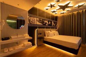 Postel nebo postele na pokoji v ubytování Motel TwentyOne + 8 fotografií