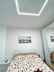 Ein Bett oder Betten in einem Zimmer der Unterkunft Luxury Tugurio
