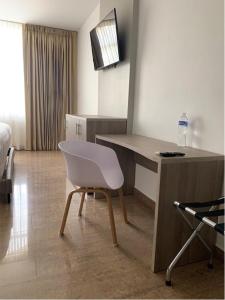 TV a/nebo společenská místnost v ubytování HOTEL DIANA PRINCESS + 12 fotografií