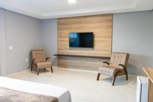 Μια τηλεόραση ή/και κέντρο ψυχαγωγίας στο Royal Hotel
