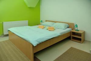 Postel nebo postele na pokoji v ubytování Hostel Paparazzo & Apartmens