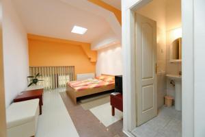 Postel nebo postele na pokoji v ubytování Hostel Paparazzo & Apartmens
