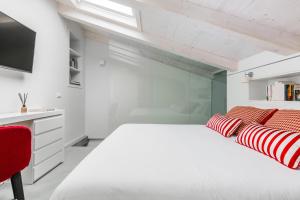 A bed or beds in a room at Manganelli Suite