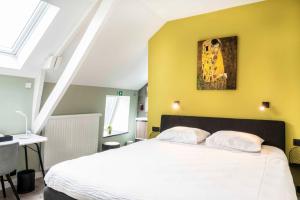 Postel nebo postele na pokoji v ubytování L'ARTiste + 34 fotografií