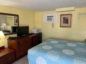 Katil atau katil-katil dalam bilik di Budget Inn Motel Suites Somers Point