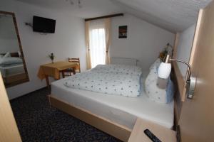 Postel nebo postele na pokoji v ubytování Haus Sonnenhang