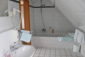 Koupelna v ubytování Hotel Ideal