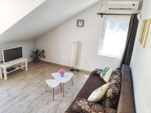 Televízia a/alebo spoločenská miestnosť v ubytovaní Adriatic Pearl Korcula