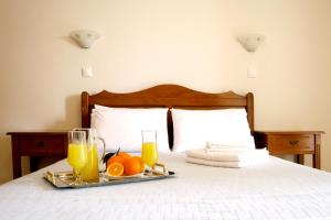 Cama o camas de una habitación en Zouzoulas Filoxenia - Koralia Apartments