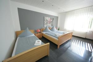Postel nebo postele na pokoji v ubytování Hotel am Rosenplatz,24 Stunden Check in, kostenfreie Parkplätze