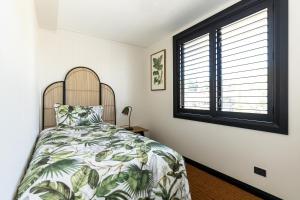 Llit o llits en una habitació de Arthouse Botanic Lake Tekapo