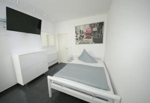 Postel nebo postele na pokoji v ubytování Hotel am Rosenplatz,24 Stunden Check in, kostenfreie Parkplätze