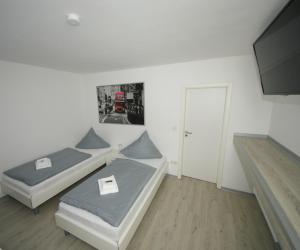 Postel nebo postele na pokoji v ubytování Hotel am Rosenplatz,24 Stunden Check in, kostenfreie Parkplätze