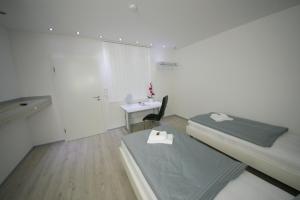 Postel nebo postele na pokoji v ubytování Hotel am Rosenplatz,24 Stunden Check in, kostenfreie Parkplätze