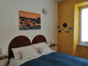 מיטה או מיטות בחדר ב-Ca' de Speza