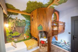 Posteľ alebo postele v izbe v ubytovaní Paradisio Baby & Kinder Hotel