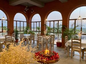 A restaurant or other place to eat at Kaner Retreat - India's First Desert Botanical Resort