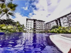 Piscina di Amaia Steps Nuvali fully furnished unit with swimming pool view near Carmelray Pitland o nelle vicinanze