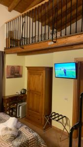 Ein Bett oder Betten in einem Zimmer der Unterkunft Agriturismo La Palazzina