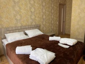 Ένα ή περισσότερα κρεβάτια σε δωμάτιο στο Hotel Garbani