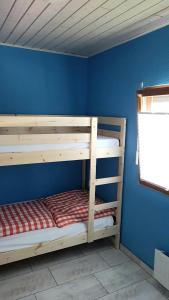 Postel nebo postele na pokoji v ubytování Ferienhaus FH5 "Haus Svenja" + 2 fotografie