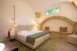 Postel nebo postele na pokoji v ubytování Palazzo De Noha - Boutique Hotel + 37 fotografií