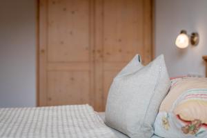 Postel nebo postele na pokoji v ubytování Haus Stolz