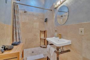 a bathroom with a sink and a shower at Cypress House & Studio, Walk to Healdsburg Plaza home in Healdsburg