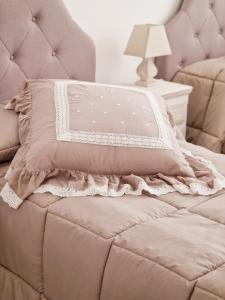 A bed or beds in a room at Villa Anna holiday house