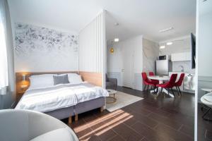 Ένα ή περισσότερα κρεβάτια σε δωμάτιο στο Villa Kamila