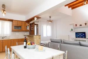 A kitchen or kitchenette at Stamatina House