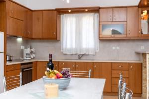 A kitchen or kitchenette at Stamatina House