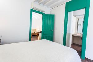 Cama o camas de una habitación en Laurel Suites Apartments