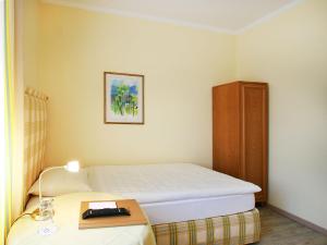 Postelja oz. postelje v sobi nastanitve Hotel Garni Golf