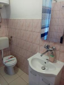 Kylpyhuone majoituspaikassa Apartman Petra