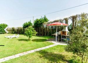 Zahrada ubytování Villa tranquila con piscina y jardín "el Cachivache"
